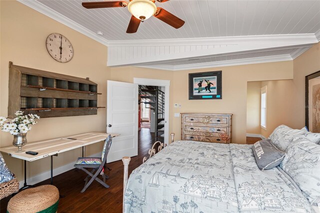 bedroom featuring dark hardwood / wood-style flooring, crown molding, and ceiling fan