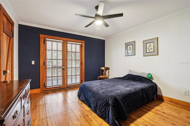 bedroom with a ceiling fan, light wood-style floors, baseboards, and ornamental molding