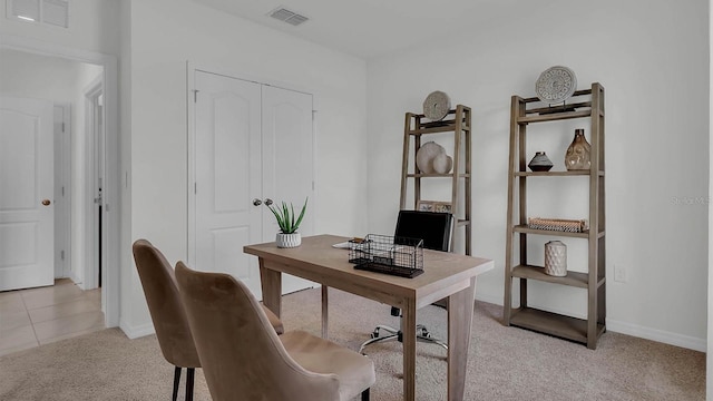 home office with light carpet