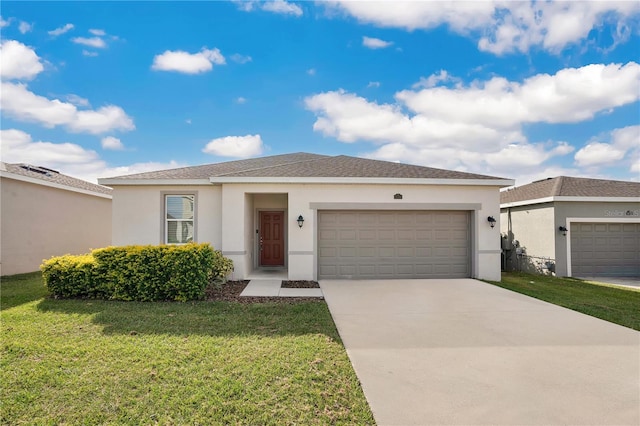 view of front of house with a front lawn and a garage