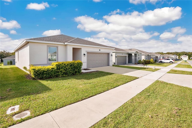 single story home with a front yard and a garage