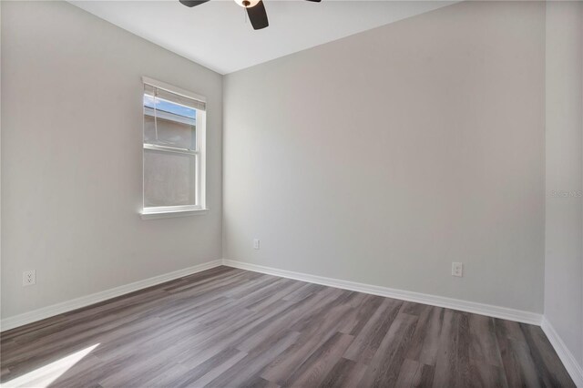 empty room featuring ceiling fan and wood-type flooring