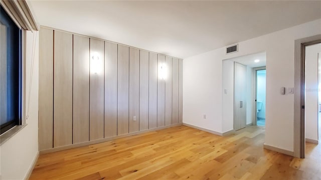 empty room with light wood-type flooring