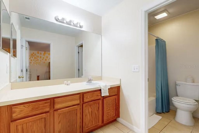 full bathroom with vanity, shower / bath combo with shower curtain, toilet, and tile patterned flooring