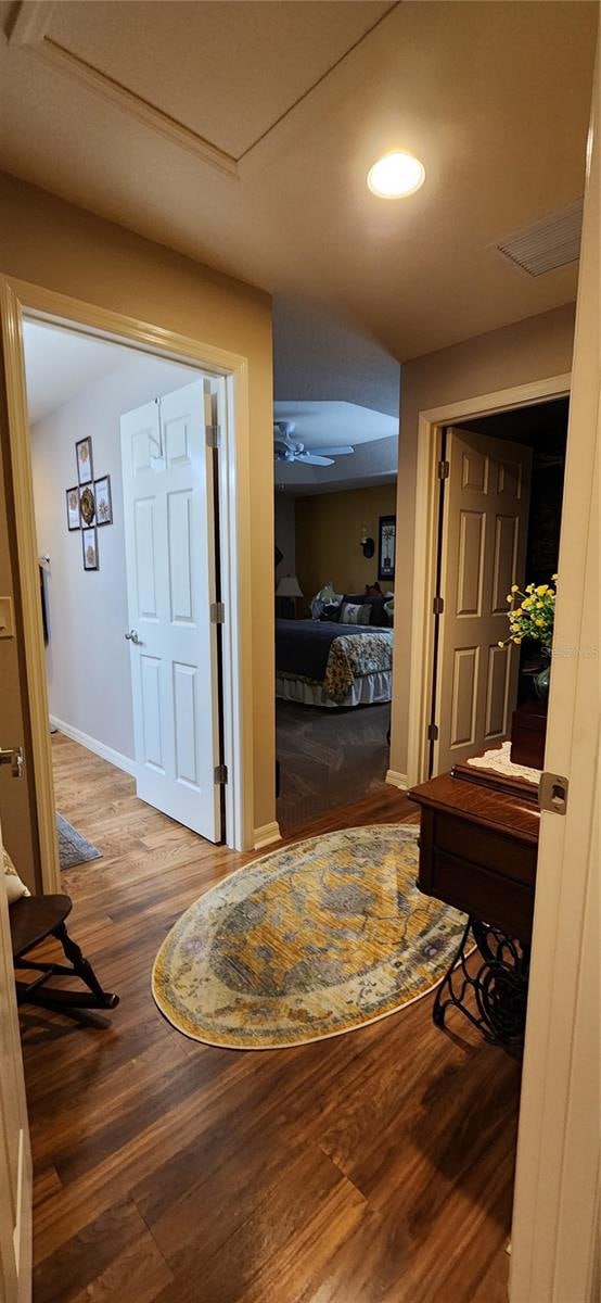 hallway featuring hardwood / wood-style floors