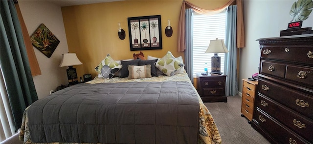 bedroom featuring light carpet and multiple windows