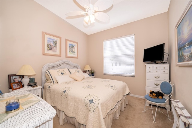 bedroom with light carpet and ceiling fan