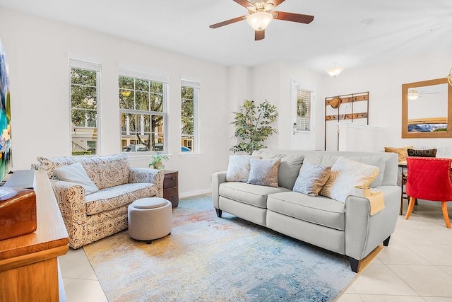 tiled living room featuring ceiling fan