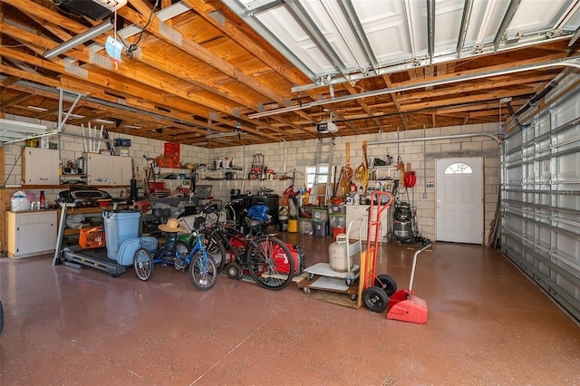 garage featuring a garage door opener