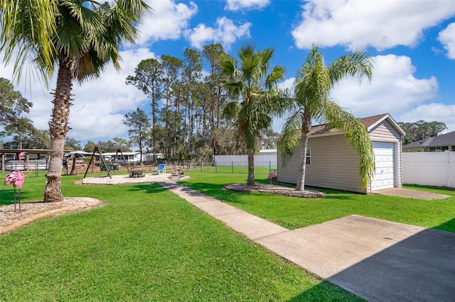 view of yard featuring a garage