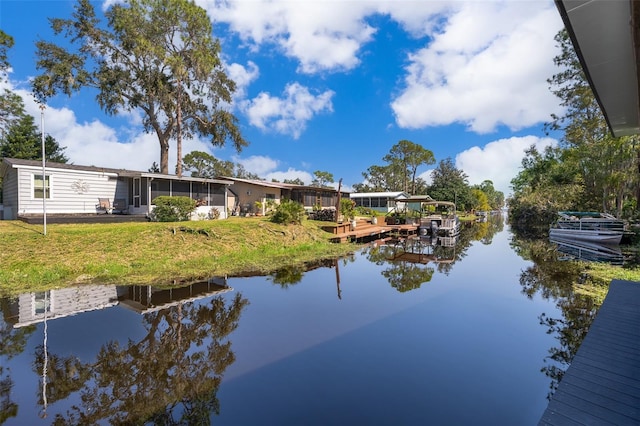 view of water feature with a boat dock