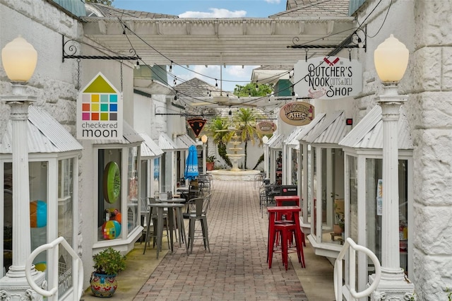 view of patio featuring an outdoor bar