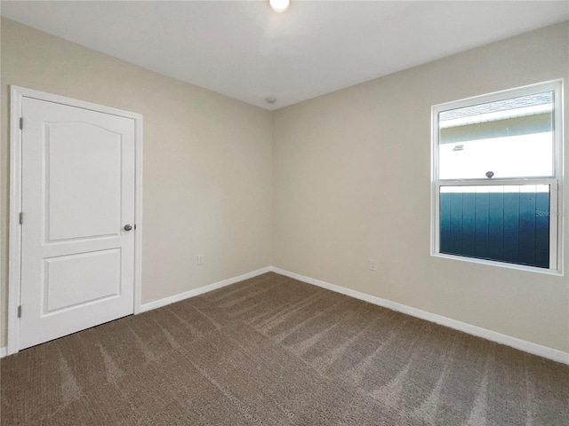 view of carpeted spare room