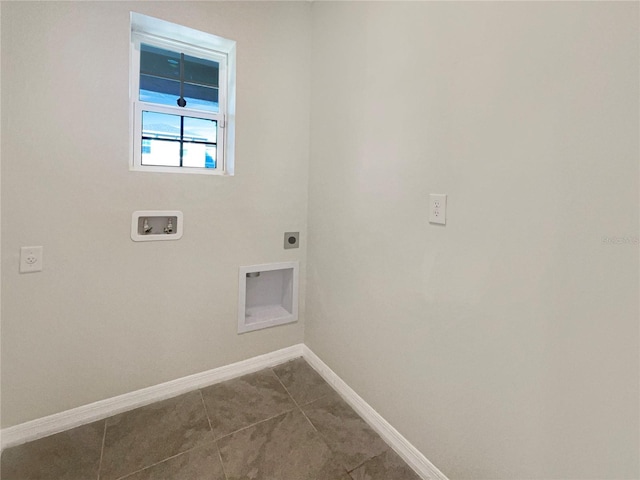 laundry area with hookup for an electric dryer, hookup for a washing machine, and tile patterned floors