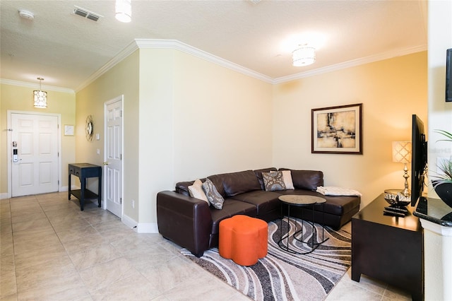 living room featuring crown molding and a textured ceiling