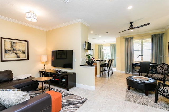 tiled living room with crown molding and ceiling fan