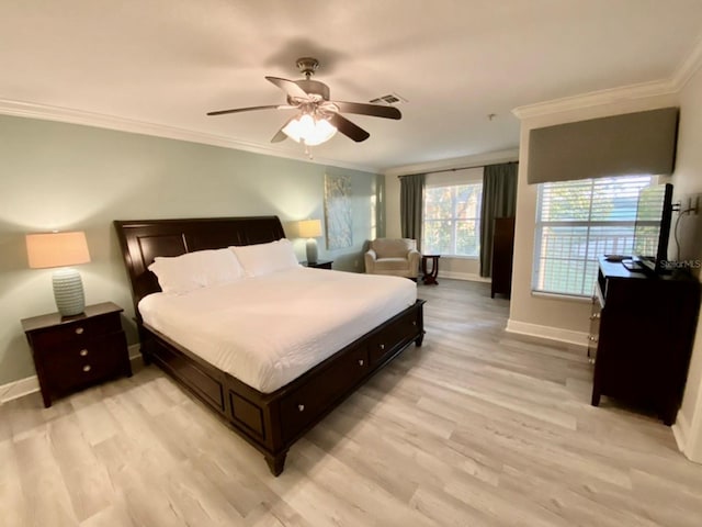 bedroom with ceiling fan, crown molding, and light wood-type flooring