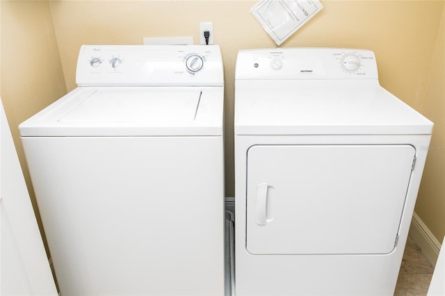 laundry area featuring independent washer and dryer