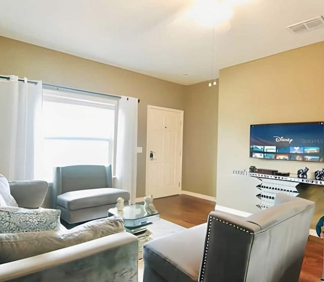 living room with dark wood-type flooring