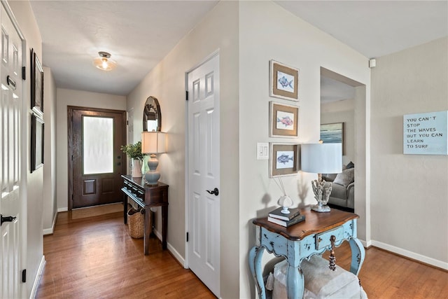 doorway to outside featuring hardwood / wood-style flooring