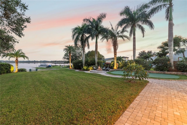 exterior space with a water view