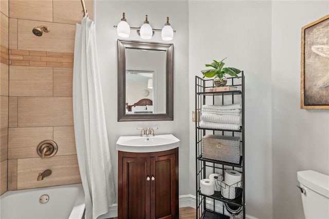 full bathroom with vanity, toilet, and shower / bath combo