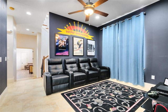 cinema room featuring ceiling fan