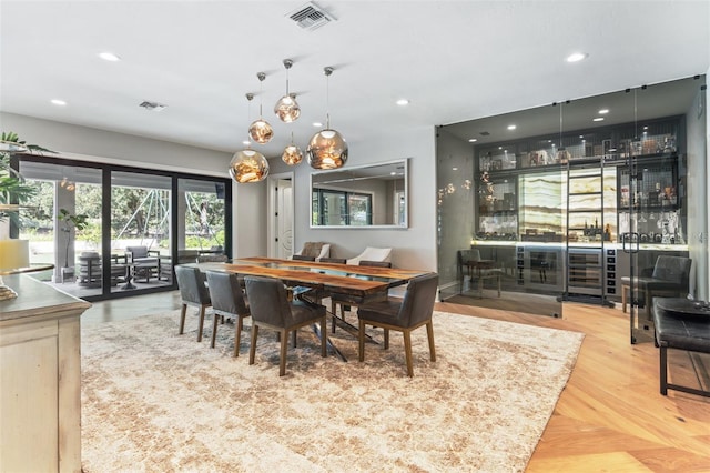 dining space featuring hardwood / wood-style flooring