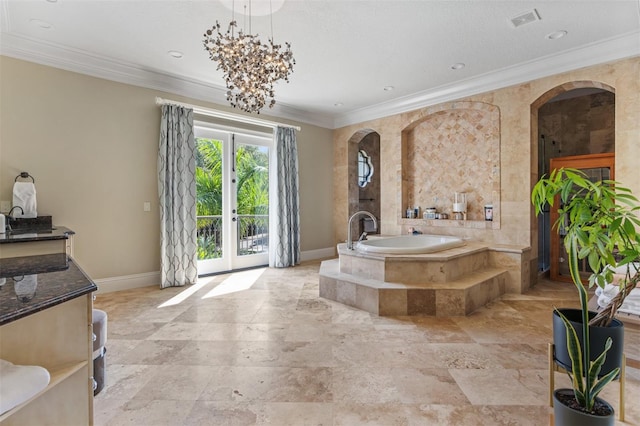 bathroom with a relaxing tiled tub, ornamental molding, a notable chandelier, and french doors