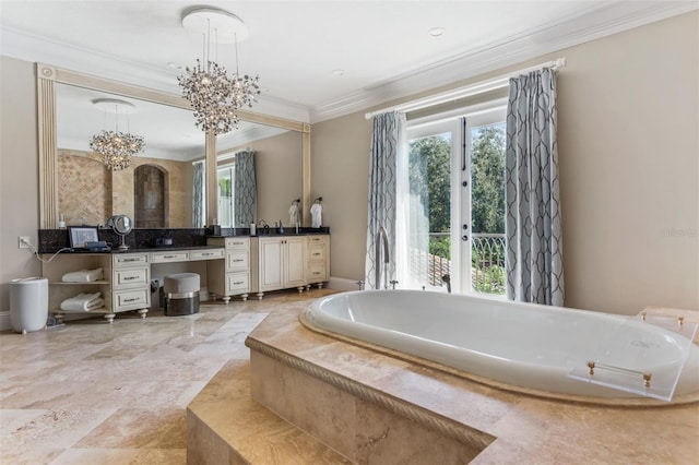 bathroom featuring vanity, an inviting chandelier, crown molding, and tiled bath