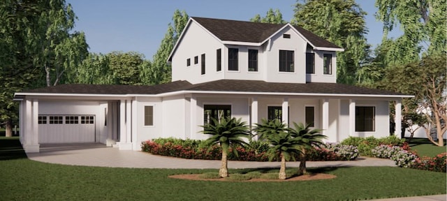 view of front of house featuring a front lawn and a garage