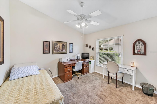 bedroom featuring light colored carpet, vaulted ceiling, and ceiling fan