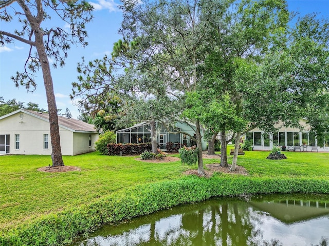 view of yard featuring a water view