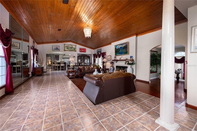 tiled living room featuring ornamental molding, wood ceiling, and high vaulted ceiling