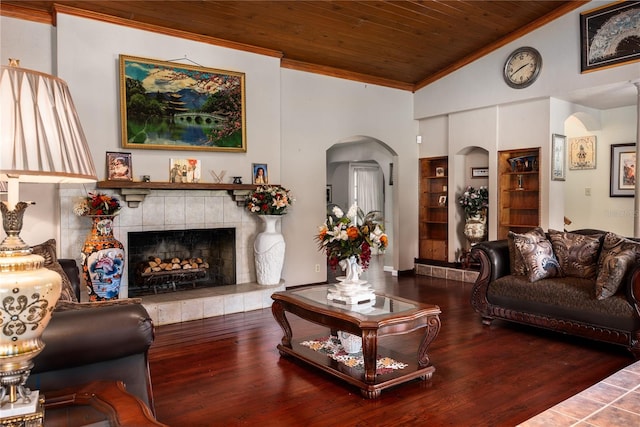 living room with a tiled fireplace, hardwood / wood-style flooring, wooden ceiling, and vaulted ceiling