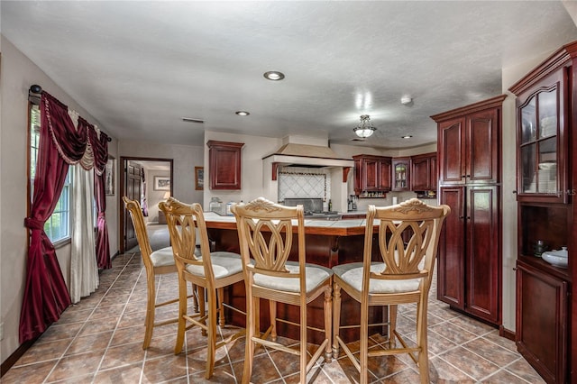 kitchen featuring premium range hood