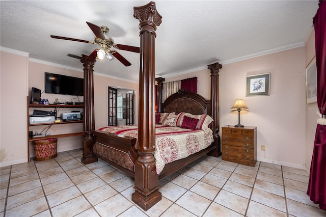 tiled bedroom with crown molding, a textured ceiling, ornate columns, and ceiling fan