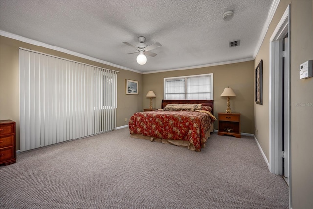 carpeted bedroom featuring crown molding, a textured ceiling, and ceiling fan