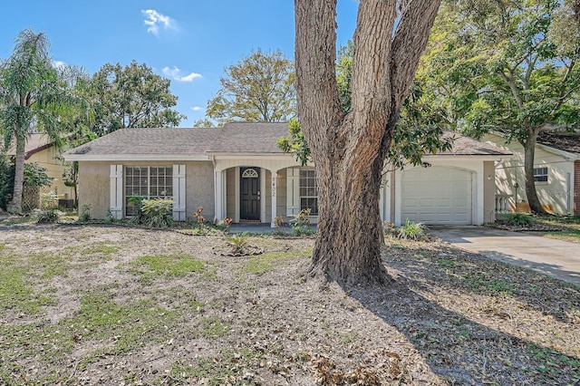 ranch-style home featuring a garage and a porch