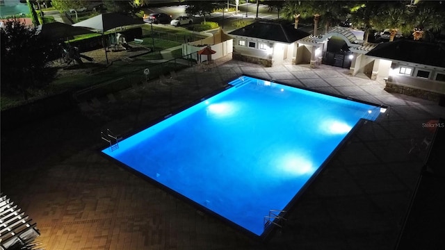 view of pool with a patio area and an outdoor kitchen