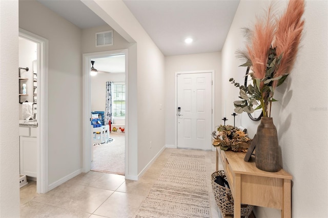 interior space with light tile patterned floors