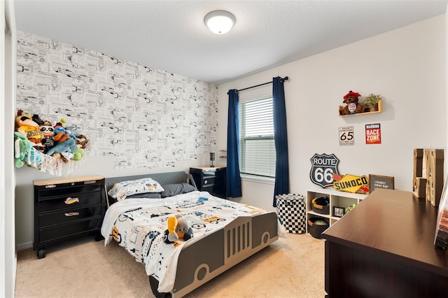 bedroom featuring light colored carpet