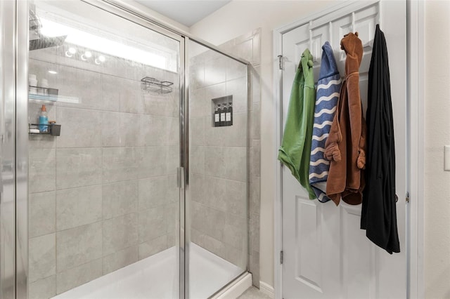 bathroom featuring an enclosed shower