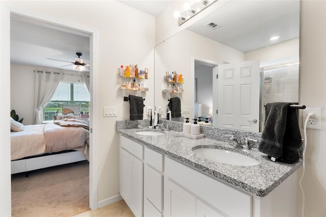 bathroom featuring vanity and ceiling fan