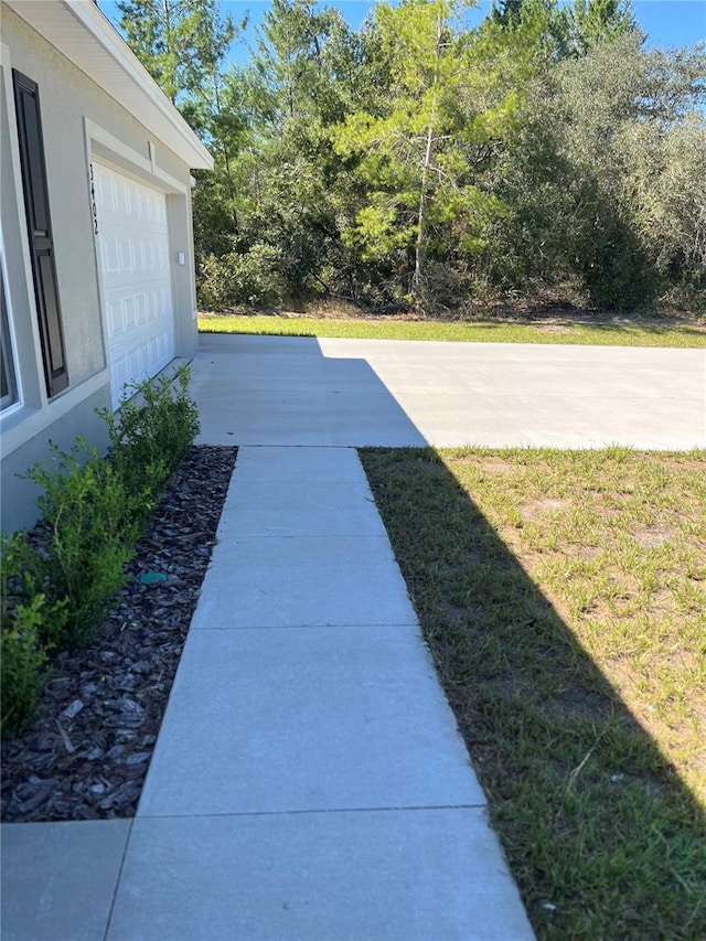 view of yard with a garage