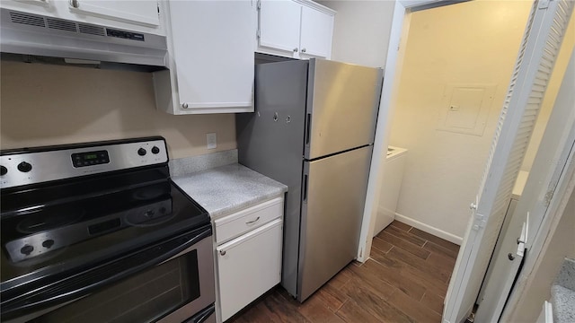 kitchen featuring dark hardwood / wood-style floors, ventilation hood, white cabinetry, electric panel, and appliances with stainless steel finishes