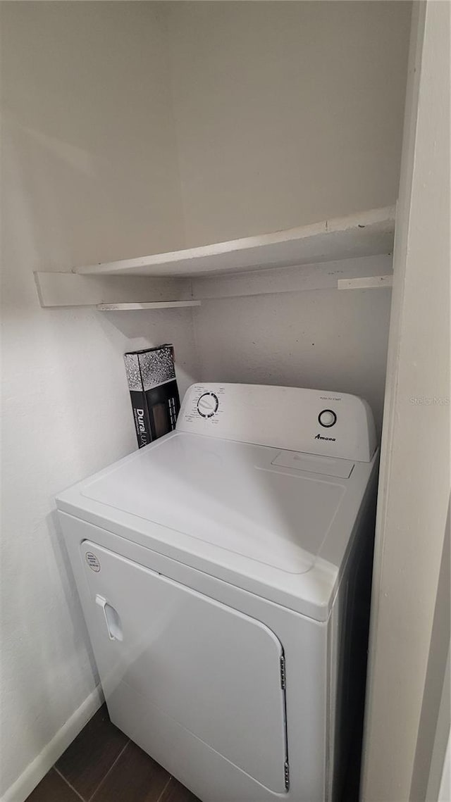 clothes washing area with washer / clothes dryer