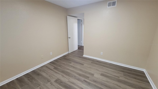 empty room with light wood-type flooring