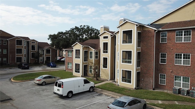 view of property featuring central air condition unit