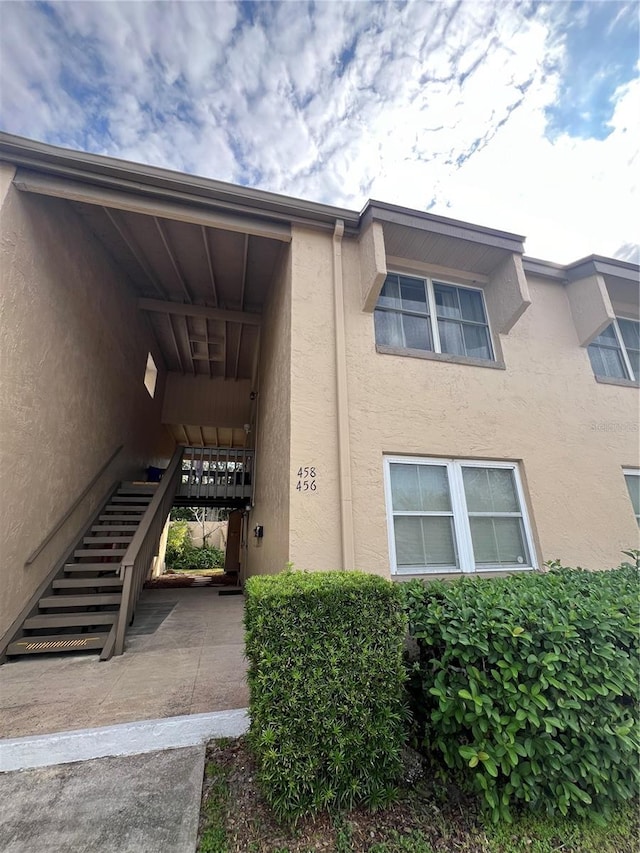 458 Windmeadows St, Altamonte Springs, FL 32701 - entrance to property featuring stucco siding
